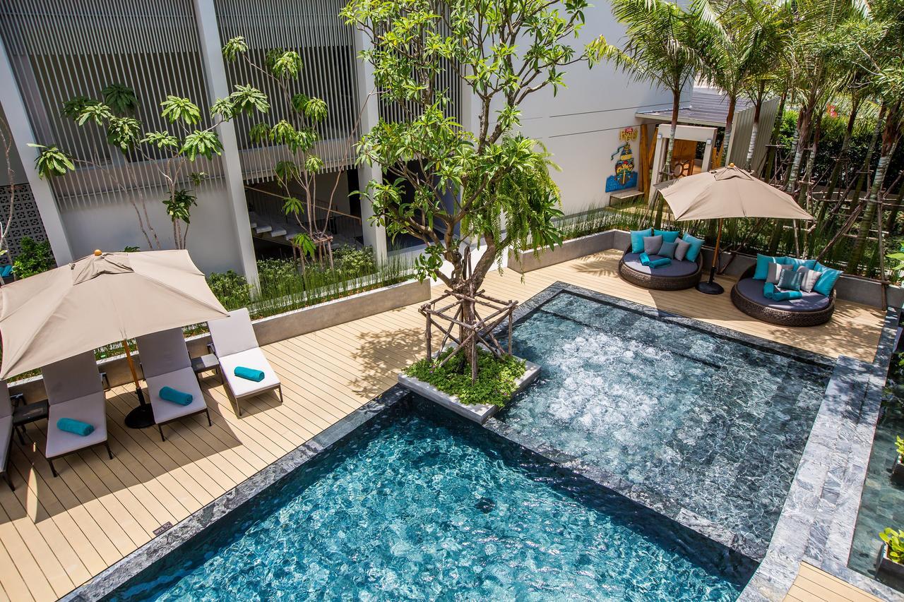 Fusion Suites Phuket Patong Bagian luar foto The swimming pool at the hotel