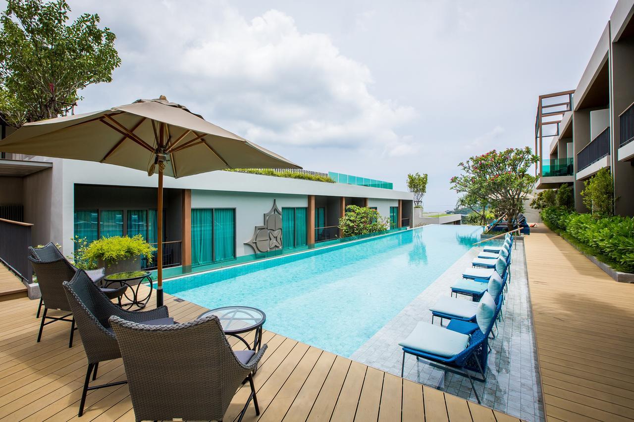 Fusion Suites Phuket Patong Bagian luar foto The swimming pool at the hotel